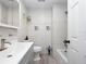 Clean bathroom, grey vanity, and tiled shower/tub at 2911 Dudley Dr, Bartow, FL 33830