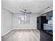 Kitchen boasts modern appliances, blue cabinets, and vinyl flooring at 2911 Dudley Dr, Bartow, FL 33830