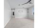 Spacious living room with grey carpet, ceiling fan, and neutral walls at 2911 Dudley Dr, Bartow, FL 33830