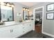 Elegant bathroom with double vanity and walk-in shower at 355 Carriage Way Ct, Oviedo, FL 32765