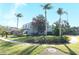 Two-story house with landscaping, driveway, and American flag at 355 Carriage Way Ct, Oviedo, FL 32765