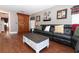 Relaxing living room with leather sofa and coffee table at 355 Carriage Way Ct, Oviedo, FL 32765