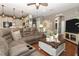 Open concept living space with kitchen view at 355 Carriage Way Ct, Oviedo, FL 32765