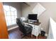 Charming home office with built-in desk and large window at 355 Carriage Way Ct, Oviedo, FL 32765