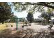 playground with swings and climbing equipment at 355 Carriage Way Ct, Oviedo, FL 32765