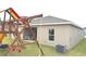 Backyard with playground, patio furniture, and AC unit at 3653 Yarian Dr, Haines City, FL 33844