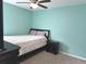 Bedroom with teal walls, carpet, and a double bed at 3653 Yarian Dr, Haines City, FL 33844