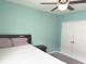 Spacious bedroom with light teal walls and double doors at 3653 Yarian Dr, Haines City, FL 33844