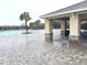 Inviting poolside pavilion with stone accents at 3653 Yarian Dr, Haines City, FL 33844