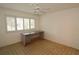 Bright bedroom with window shutters and built-in desk at 497 Oak Haven Dr, Altamonte Springs, FL 32701