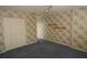 Bedroom with floral wallpaper, blue carpet, and double doors at 497 Oak Haven Dr, Altamonte Springs, FL 32701