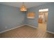 Dining area with tile floor and kitchen pass-through at 497 Oak Haven Dr, Altamonte Springs, FL 32701
