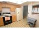Kitchen features gas range, refrigerator, and ample cabinet space at 497 Oak Haven Dr, Altamonte Springs, FL 32701
