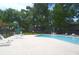 Relaxing community pool with lounge chairs at 497 Oak Haven Dr, Altamonte Springs, FL 32701