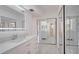 Modern bathroom with double vanity and marble floors at 5019 Nassau Cir # 5, Orlando, FL 32808