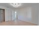 Well-lit bedroom with wood-look floors and built-in shelving at 5019 Nassau Cir # 5, Orlando, FL 32808