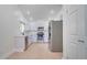 Modern kitchen with stainless steel appliances and light-colored cabinetry at 5019 Nassau Cir # 5, Orlando, FL 32808