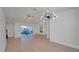 Spacious living area with hardwood floors, a fireplace, and access to the patio at 5019 Nassau Cir # 5, Orlando, FL 32808