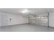 Attached garage with light gray flooring and automatic opener at 5100 Neponset Ave, Orlando, FL 32808