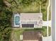Home with solar panels and a pool at 562 Eagle Pointe S, Kissimmee, FL 34746