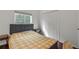 Bedroom with double bed, nightstands, and double door closet at 562 Eagle Pointe S, Kissimmee, FL 34746