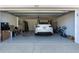 Garage with EV charger and extra storage at 562 Eagle Pointe S, Kissimmee, FL 34746