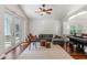 Living room with comfy sectional sofa and access to patio at 562 Eagle Pointe S, Kissimmee, FL 34746