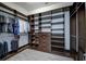 Large walk-in closet with ample shelving and hanging space at 7901 Dausset St, Orlando, FL 32827
