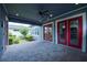 Covered patio with paver stones and access to backyard at 7901 Dausset St, Orlando, FL 32827