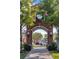 Brick archway entrance to Winter Garden with clock tower at 998 Nathan Ridge Rd, Clermont, FL 34715