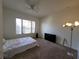 Bedroom with carpet flooring and a TV at 12216 Wild Iris Way # 112, Orlando, FL 32837