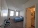 Bedroom with bathroom access and carpet flooring at 12216 Wild Iris Way # 112, Orlando, FL 32837