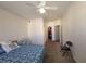 Main bedroom with a large bed and walk-in closet at 12216 Wild Iris Way # 112, Orlando, FL 32837