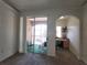 Bedroom with access to a private balcony and an office area at 12216 Wild Iris Way # 112, Orlando, FL 32837