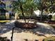 Circular courtyard with manicured landscaping at 12216 Wild Iris Way # 112, Orlando, FL 32837