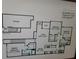 Second floor unit floor plan showcasing three bedrooms, two bathrooms, a living area, and a garage at 12216 Wild Iris Way # 112, Orlando, FL 32837
