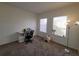 Home office with built-in desk and carpet flooring at 12216 Wild Iris Way # 112, Orlando, FL 32837