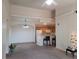 Spacious living room with kitchen and breakfast bar at 12216 Wild Iris Way # 112, Orlando, FL 32837