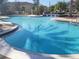 Community pool with a relaxing atmosphere at 12216 Wild Iris Way # 112, Orlando, FL 32837