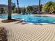 Inviting community pool with ample deck space at 12216 Wild Iris Way # 112, Orlando, FL 32837