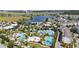 Community pool, lake, and residential area at 13444 Stoddart Ave, Orlando, FL 32827