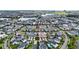Aerial view of a townhome community near a lake at 13444 Stoddart Ave, Orlando, FL 32827