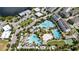 Community pool and residential area with a basketball court at 13444 Stoddart Ave, Orlando, FL 32827