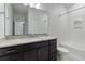 Bathroom features granite vanity and a bathtub at 13444 Stoddart Ave, Orlando, FL 32827