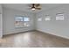 Large bedroom with multiple windows and ceiling fan at 13444 Stoddart Ave, Orlando, FL 32827