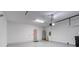 Attached garage with extra storage space and interior access at 13444 Stoddart Ave, Orlando, FL 32827