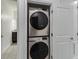 Stacked washer and dryer in a closet at 13444 Stoddart Ave, Orlando, FL 32827