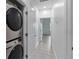 Laundry room with stackable washer and dryer at 13444 Stoddart Ave, Orlando, FL 32827