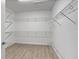 Large walk-in closet with wire shelving at 13444 Stoddart Ave, Orlando, FL 32827