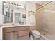 Bright bathroom with a glass-enclosed shower, single vanity, and a coordinated color scheme at 136 Woodmill Rd, Longwood, FL 32779